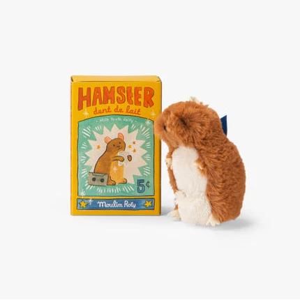 Plush toy hamster next to its packaging on a white background