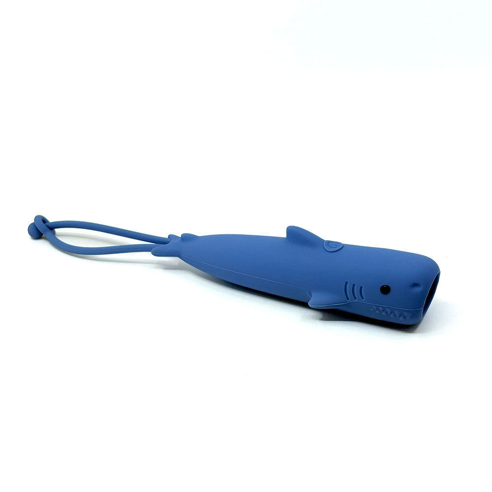 Blue shark-shaped toy on a white background